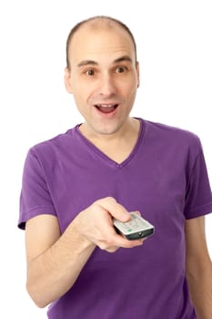 Portrait of a man with remote control watching television