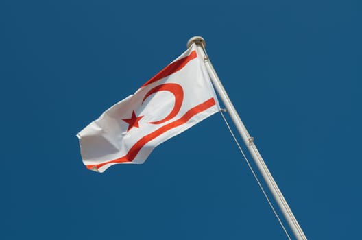Northern Cyprus Flag on pole.