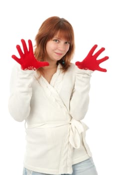 Beautiful redhead woman wint red mittens