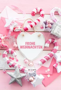 Pink Christmas decoration with love sign in heart shape