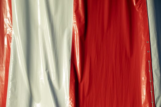 Red and white. Cover in jacket. City chicken wall. Vinyl banner.