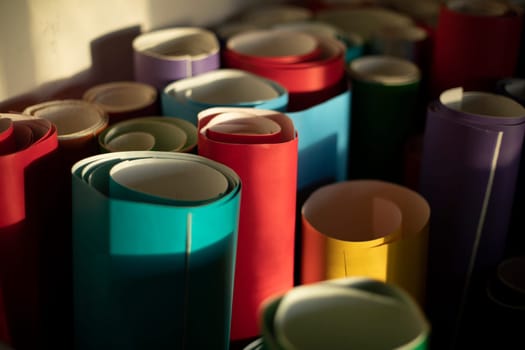 Colored paper. Film rolls. Adhesive paper for decorative works. Creative material.