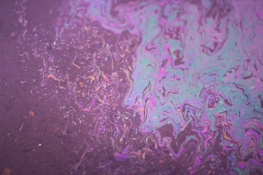 Petrol stain. Oil footprint. Bright colors. Poisoned water. Acidic texture.