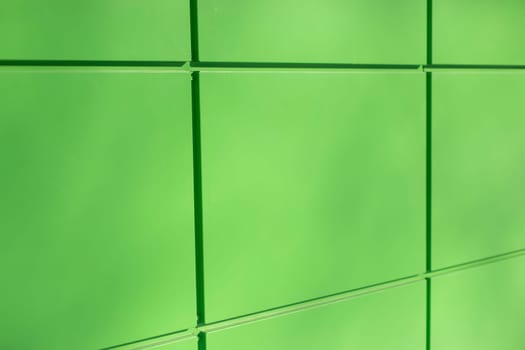 Green Wall. Building panels. They were at office house. Light green surface.