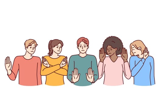 Group of multiethnic people show stop gestures not wanting to accept discrimination