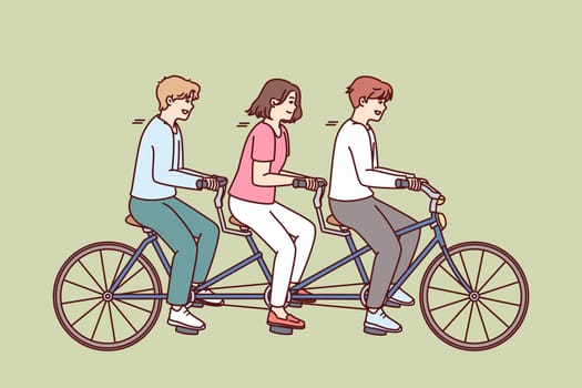 Group of people riding same bike together and enjoying shared relaxation and teamwork while walking. Concept of unity and concerted action in implementation of tasks and cohesive teamwork