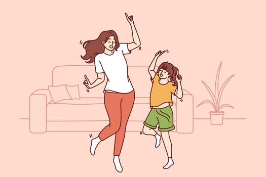 Active family of dancing young mother and daughter enjoying movement to music. Dance of teenage girl, elementary school student and mother or older sister dancing together spending free time