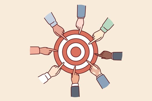 Hands of diverse people near target for concept of collaboration for solving joint task and teamwork in business. Achieving set goals to gain strategic advantages and leadership over competitors