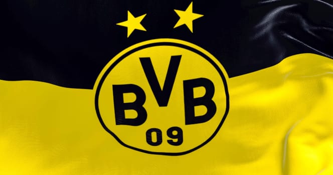 Dortmund, DE, March 2023: Flag of Borussia Dortmund waving in the wind. Borussia Dortmund is a German professional sports club based in Dortmund. Illustrative editorial 3d illustration render