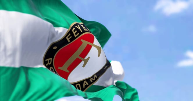 Rotterdam NED, aprile 2023: Close-up view of the Feyenoord Rotterdam flag waving in the wind. Feyenoord is a Dutch football club based in Rotterdam. Illustrative editorial 3d illustration render