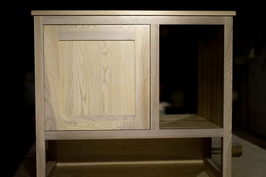 Wooden table. Furniture in workshop. Cabinet making. Raw board.