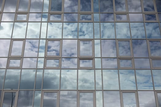 Windows in building. Mirror surface in building. Office house.