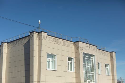 Hospital building. Technical house. Architecture in city. Lined house.