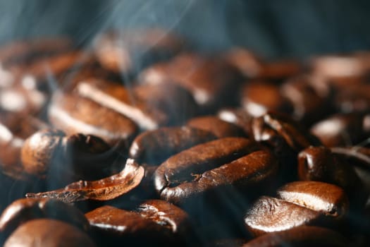 macro coffee beans in aroma smoke