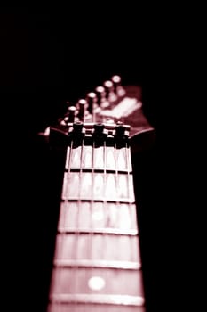guitar head strings macro on black
