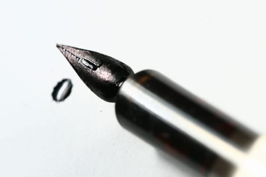 ink and pen on white paper writer