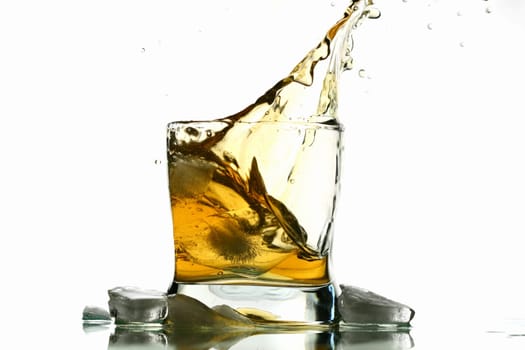 whisky splash alcohol drops isolated on white