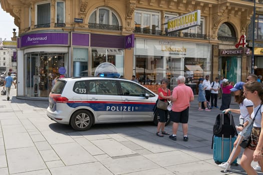 Police car during a police operation in a shopping street in the center of Vienna in Austria