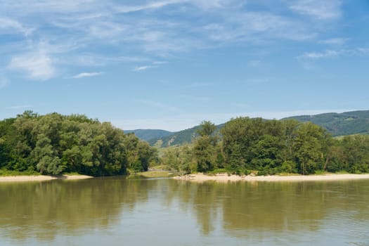 The river Danube with a small island near Duernstein in the Wachau in Austria