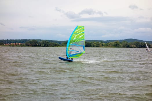 Surfing / Surfer at the Altmuehlsee, Bavaria, Germany