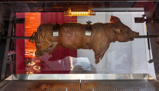 Roasted pig on the rack in Prague, Czech Republic.