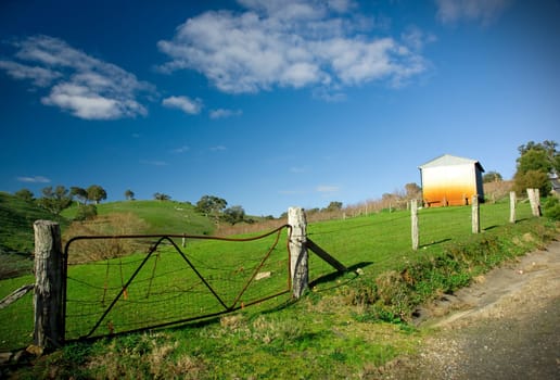 Farm Landscape with a shed and gate