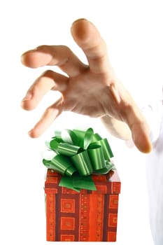 The hand tries to seize gift already soon