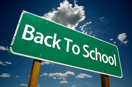 Back to School Road Sign with Dramatic Clouds and Sky.