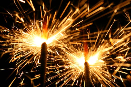christmas celebration sparklers on black background