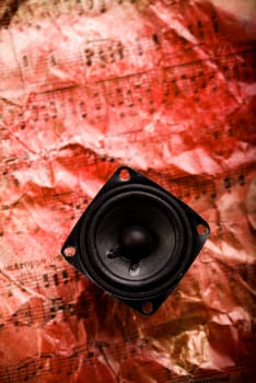 A loudspeaker, speaker, or speaker system on old notes.