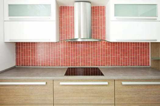 Big wooden counter and red ceramic wall