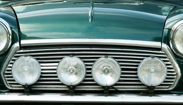 A Front view of a green sports car