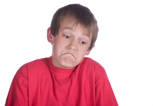 this boy is unsure of something on white