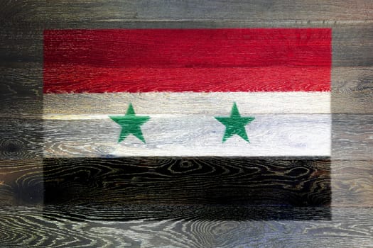 A Syria flag on rustic old wood surface background