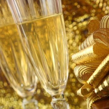 holiday card golden champagne and gift