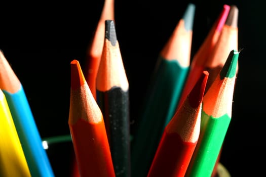 colour pencils on black macro close up