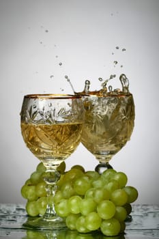 champagne with grape and the green bottle
