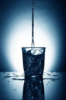 alcohol splash on gray background