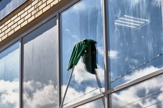 window washing, washing a street shop window. High quality photo