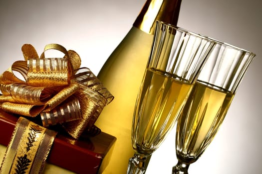 holiday card golden champagne and gift