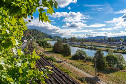 A breathtaking view from the Kaiser Wilhelm Bridge in Trier of the Moselle in a northerly direction in brilliant sunshine.
