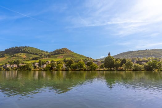 A beautiful view from Alf in the district of Cochem-Zell in Rhineland-Palatinate across the Moselle to Bullay in bright sunshine.