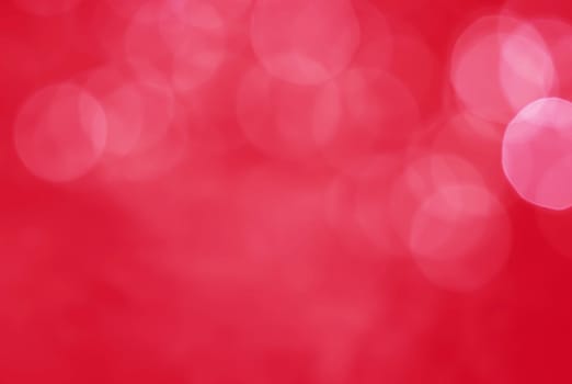 Light abstract red bokeh christmas circle color glitter blurred black background