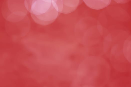 Light abstract red bokeh christmas circle color glitter blurred black background