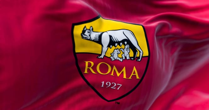 Rome, IT, march 2023: flag of AS Roma waving. AS Roma is a professional football club based in Rome. Illustrative editorial 3d illustration render. Selective focus. Close-up. Fluttering textile