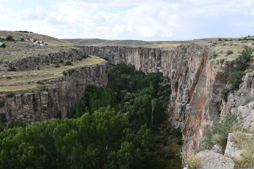 Aerial view of beautiful rocks near the forest in Aksaray, Central Anatolia, Turkey