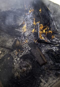 Detail of wood burning with fire and flames, destruction