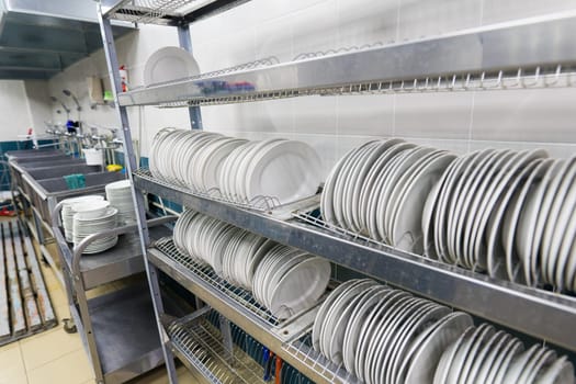 Restaurant kitchen equipment for preparing food, meal, plates, details.