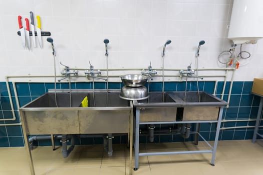 Restaurant kitchen equipment for preparing food, meal, plates, details.