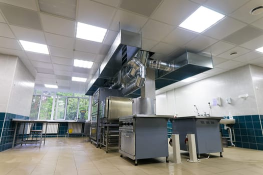 Restaurant kitchen equipment for preparing food, meal, plates, details.